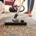 What is the best way to vacuum carpets and rugs?