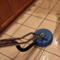 How do you deep clean tile floors?