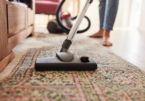 What is the best way to vacuum carpets and rugs?